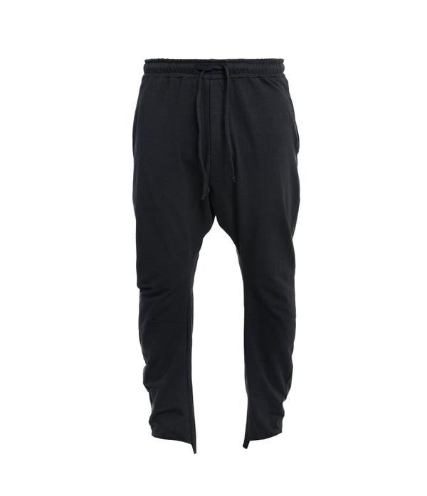 The ultimate drop crotch jogger pants. With 2 front zip pockets for convinient storage and a waistband with drawcord for an adjustable relax fit.  Lounge in style and comfort.