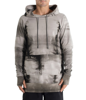 Drawstring hoodie sweatshirt crafted from medium weight cotton terry finished with ecovero* ribbing, lined hood. Hand dyed with plants using the shibori method.