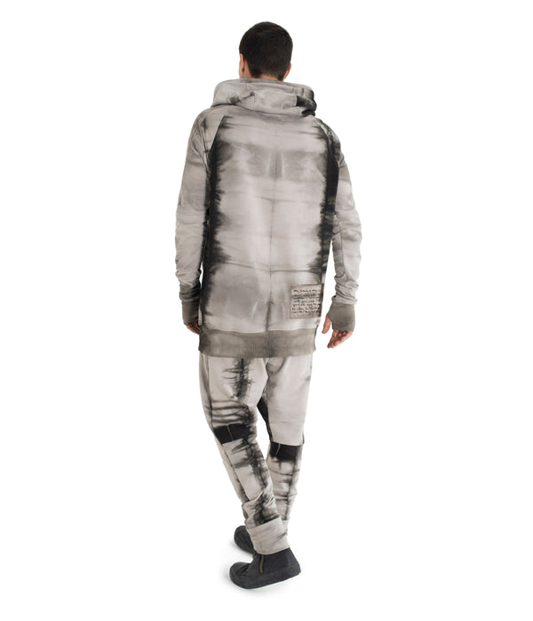 Drawstring hoodie sweatshirt crafted from medium weight cotton terry finished with ecovero* ribbing, lined hood. Hand dyed with plant with shibori method.