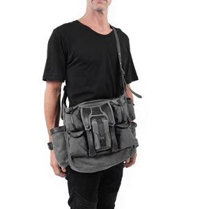 Shoulder bag, with leather strap & multiple pockets.