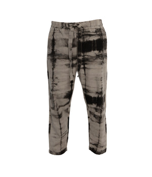 Plant dye, ankle length, unisex trousers, crafted from 100% cotton, front-tie fastening, elastic on waist and 2 front pockets.