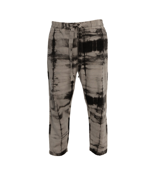 Plant dye, ankle length, unisex trousers, crafted from 100% cotton, front-tie fastening, elastic on waist and 2 front pockets.