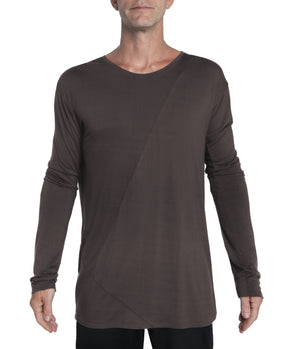 Relax fit long sleeve men's shirt crafted from light weight bamboo-cotton blend. With 2 asymmetrical seam lines on its front, and 1 vertical seam running down its back this men's shirt is simple yet unique and original.