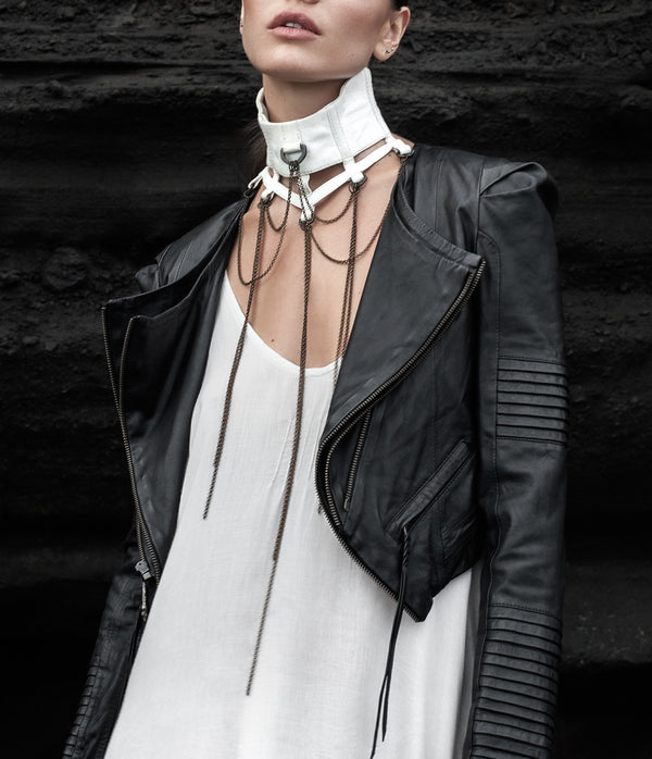  leather collar, neck piece.